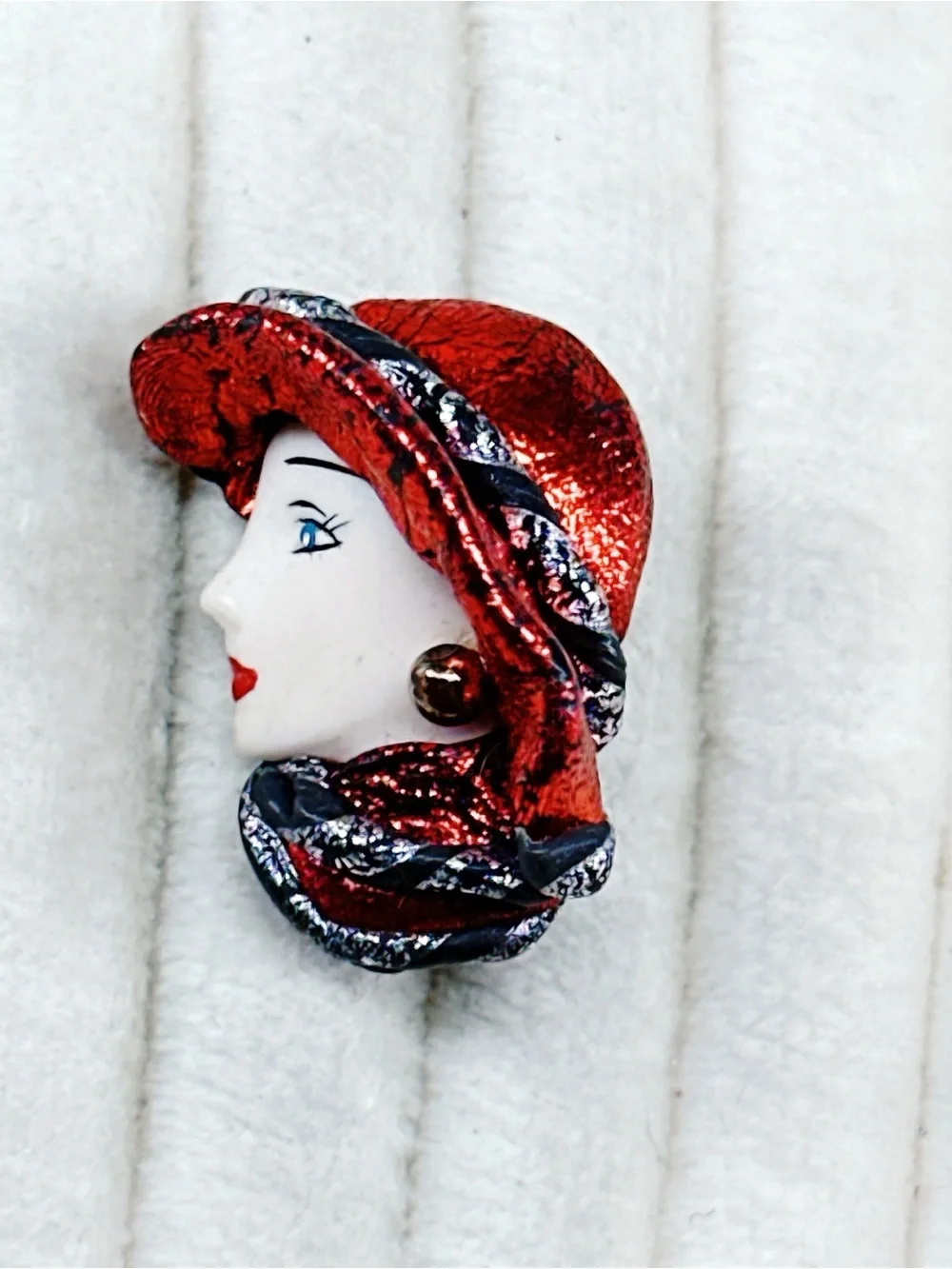 338u. Red Hat Clay Ladyface Brooch